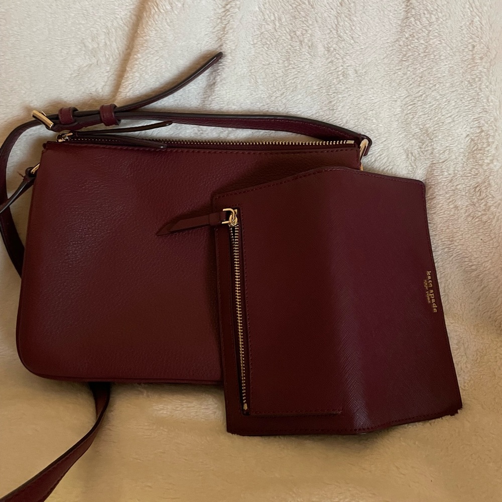 Kate Spade Maroon Crossbody bag with matching bi-fold wallet.